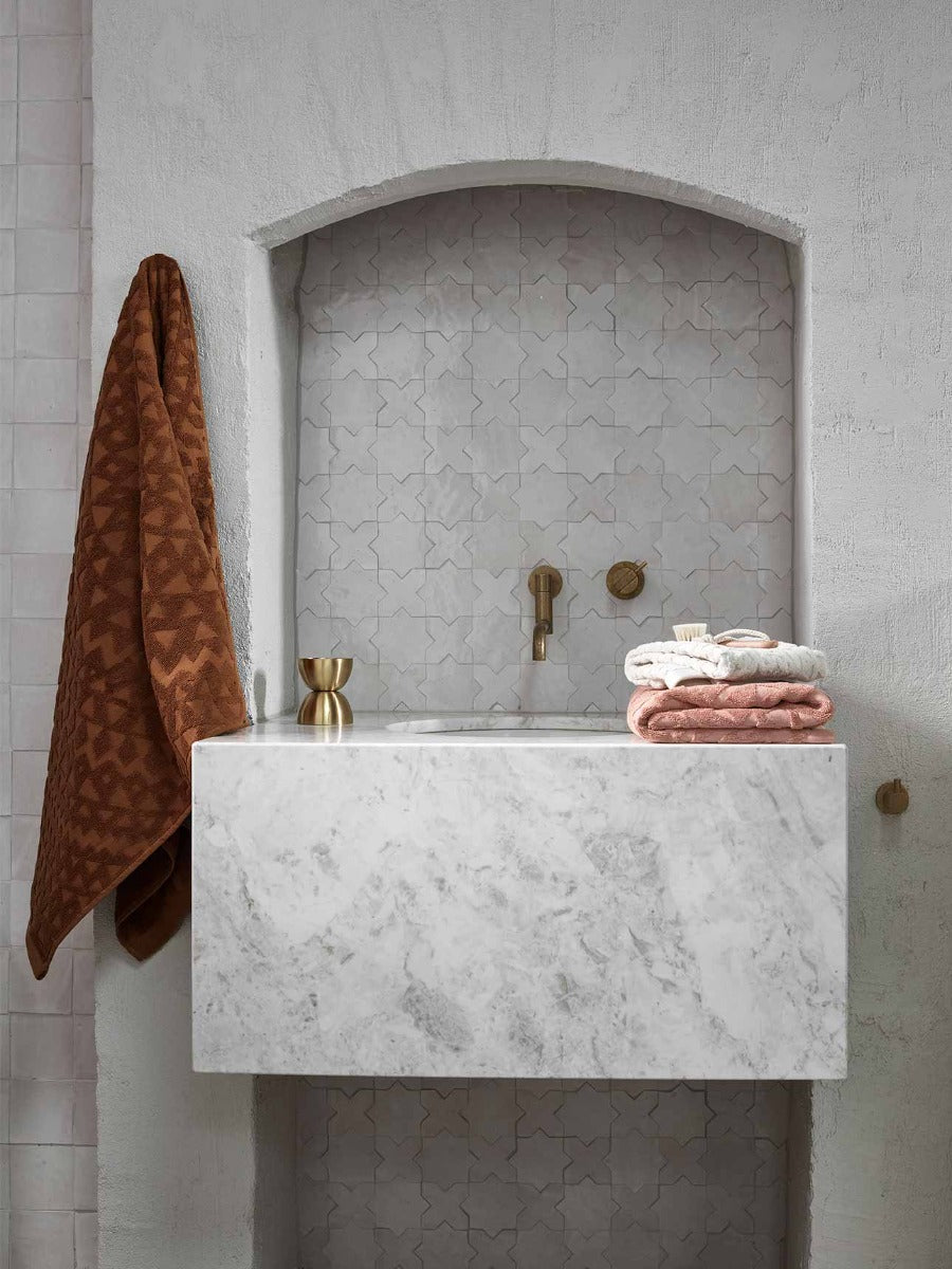 Maya Hand Towel in Sand & Clay and Maya Bath Towel in Bronze